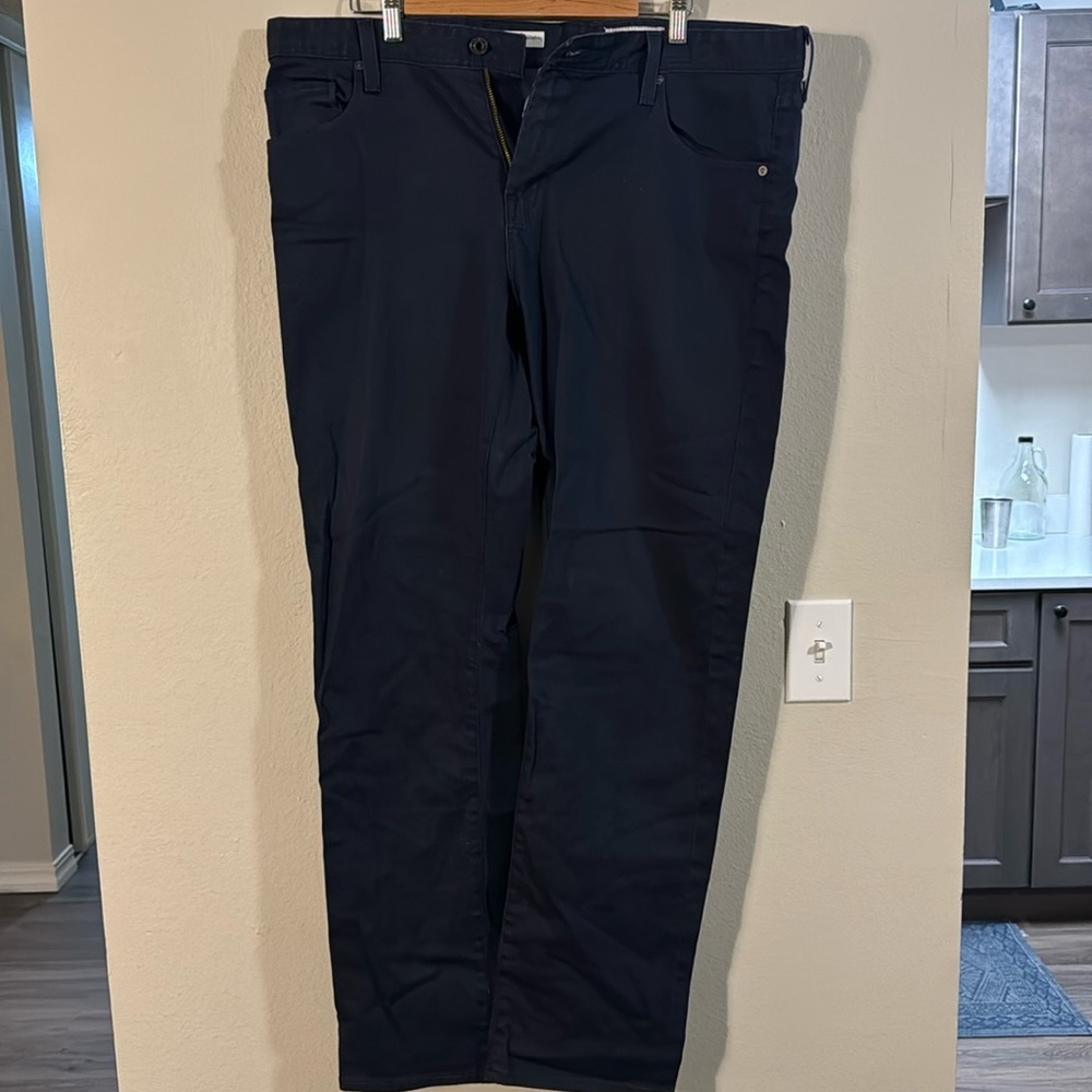 Travis Mathew/AG men’s Stretch Jeans. 38